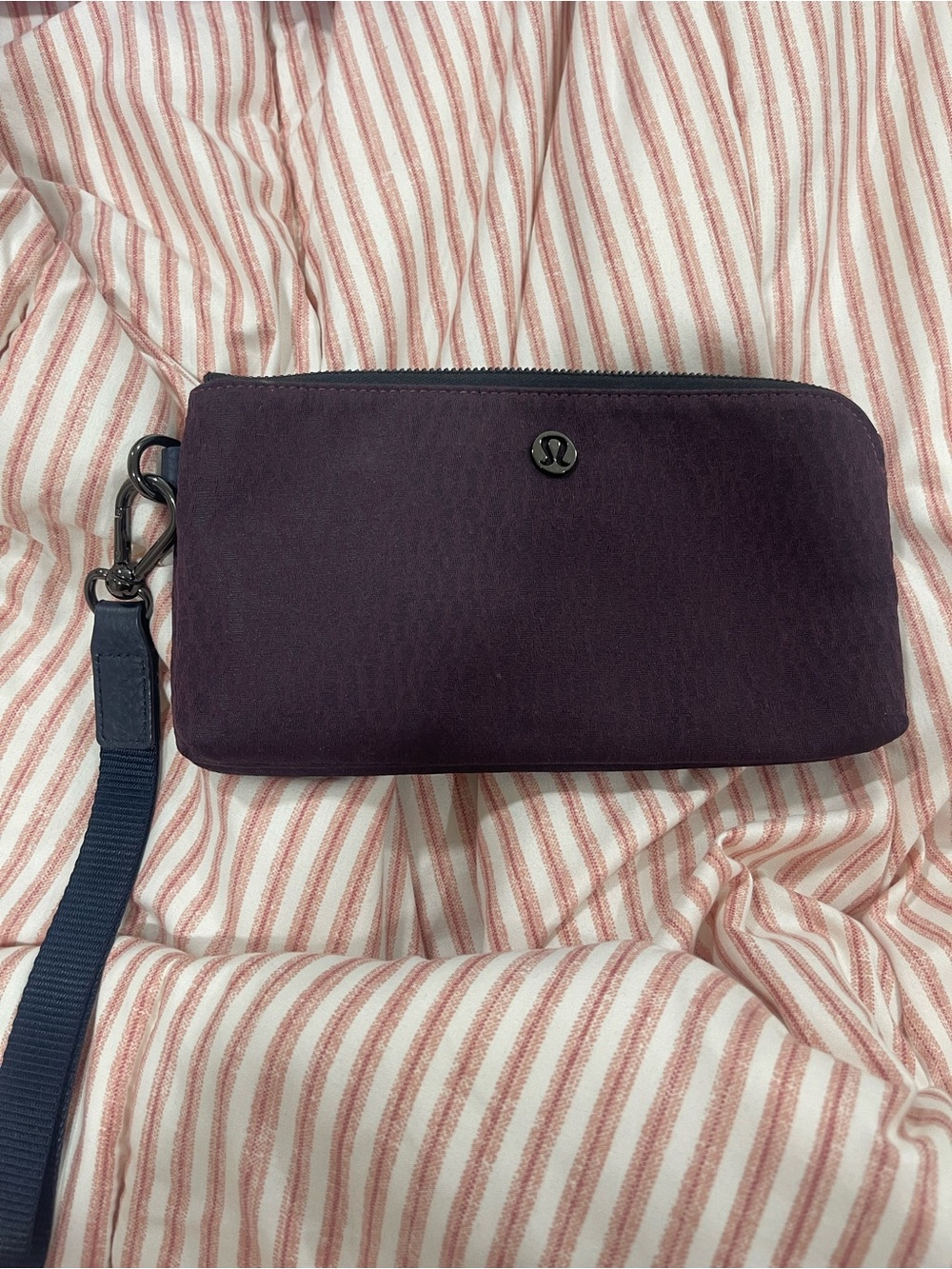 lululemon navy and plum wristlet pouch